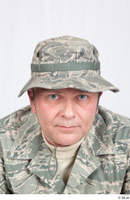  Photos Army Man in Camouflage uniform 5 20th century US air force camouflage caps  hats head 0001.jpg